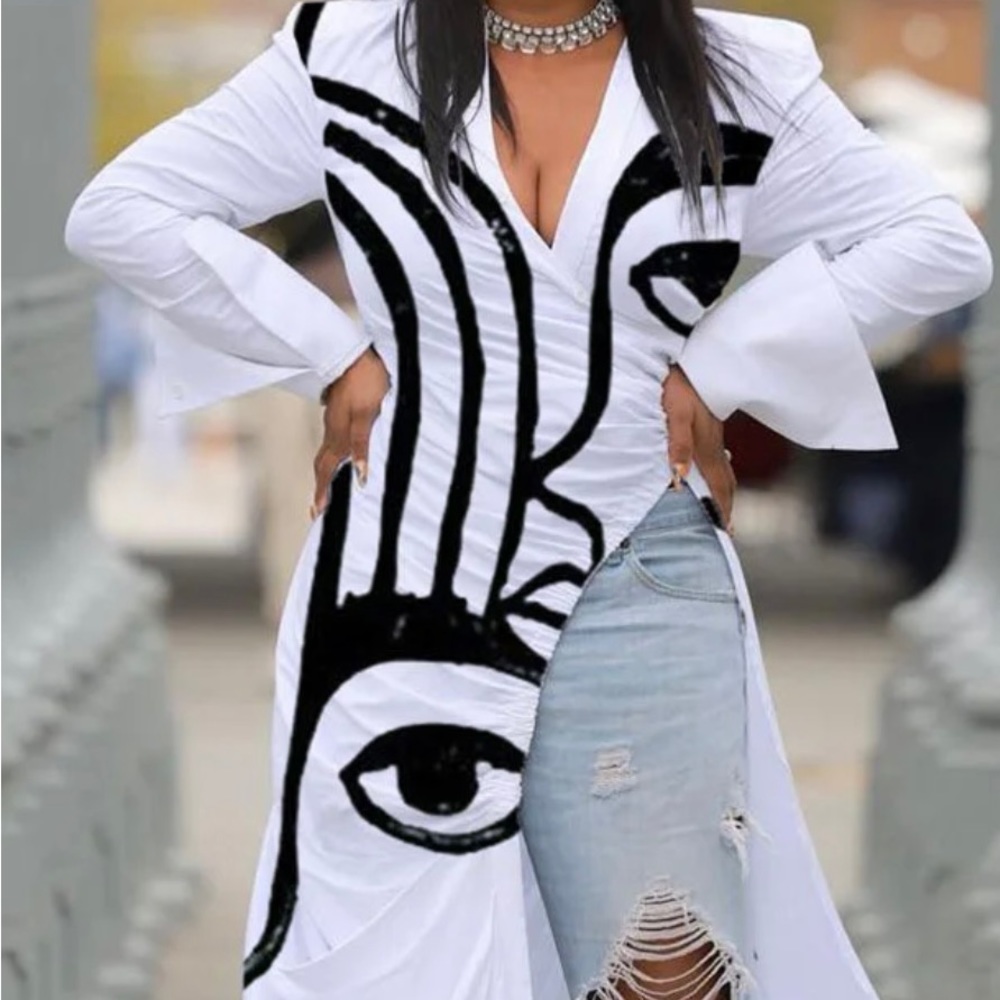 Brand New. Women's Size medium. ABSTRACT FACE PRINT SHIRT/DRESS